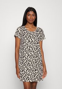 Leopard print short-sleeve dress in beige and black, featuring a rounded neckline and relaxed fit, made from soft fabric with a smooth texture.