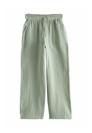 Light green wide-leg pants with elastic gathered waistband, front drawstring, and two large front patch pockets.