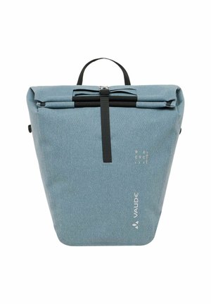 Roll-top backpack made of blue recycled fabric; features a black zipper, top handle, and white logo. Stylish triangular shape with textured surface.