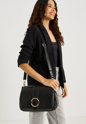 Grain de Malice, SAC BESACE À RABAT - Bandolera - noir