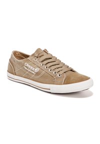 Zapatillas de lona beige con suela de goma blanca, ojales de metal y cordones tonales. Presentan detalles de marca y costura en blanco en el lateral.