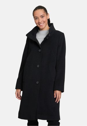 Zwarte wolmixjas met hoge kraag, voorzien van een knoopsluiting aan de voorkant, twee zijzakken en een rechte pasvorm.