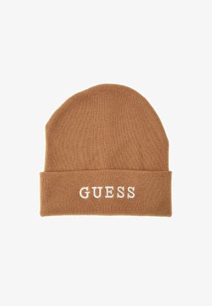 Beanie di colore marrone realizzata a maglia con risvolto a costine. Presenta la scritta bianca "GUESS" sul davanti. Tessuto morbido e vestibilità aderente.