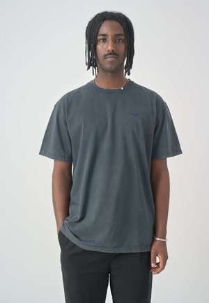 Dark gray cotton t-shirt with a crew neck and short sleeves, featuring a small blue logo on the left chest. Simple design and relaxed fit.