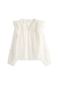 Hvid langærmet skjorte med rynkede skuldre, V-udskæring, diskrete lodrette striber og delikat prikket tekstur.