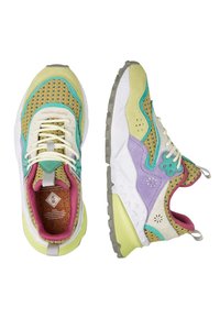 Multicolored sneakers featuring a mesh upper with yellow, green, purple, and pink accents, textured panels, and a cushioned sole.
