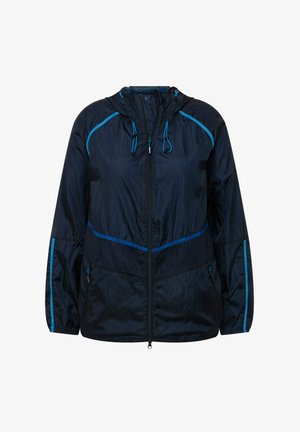 Námorní modrá lehká bunda se lesklým povrchem, s modrými akcenty, kapucí, předním zipem a dvěma bočními kapsami. Viditelná strukturovaná povrchová úprava.