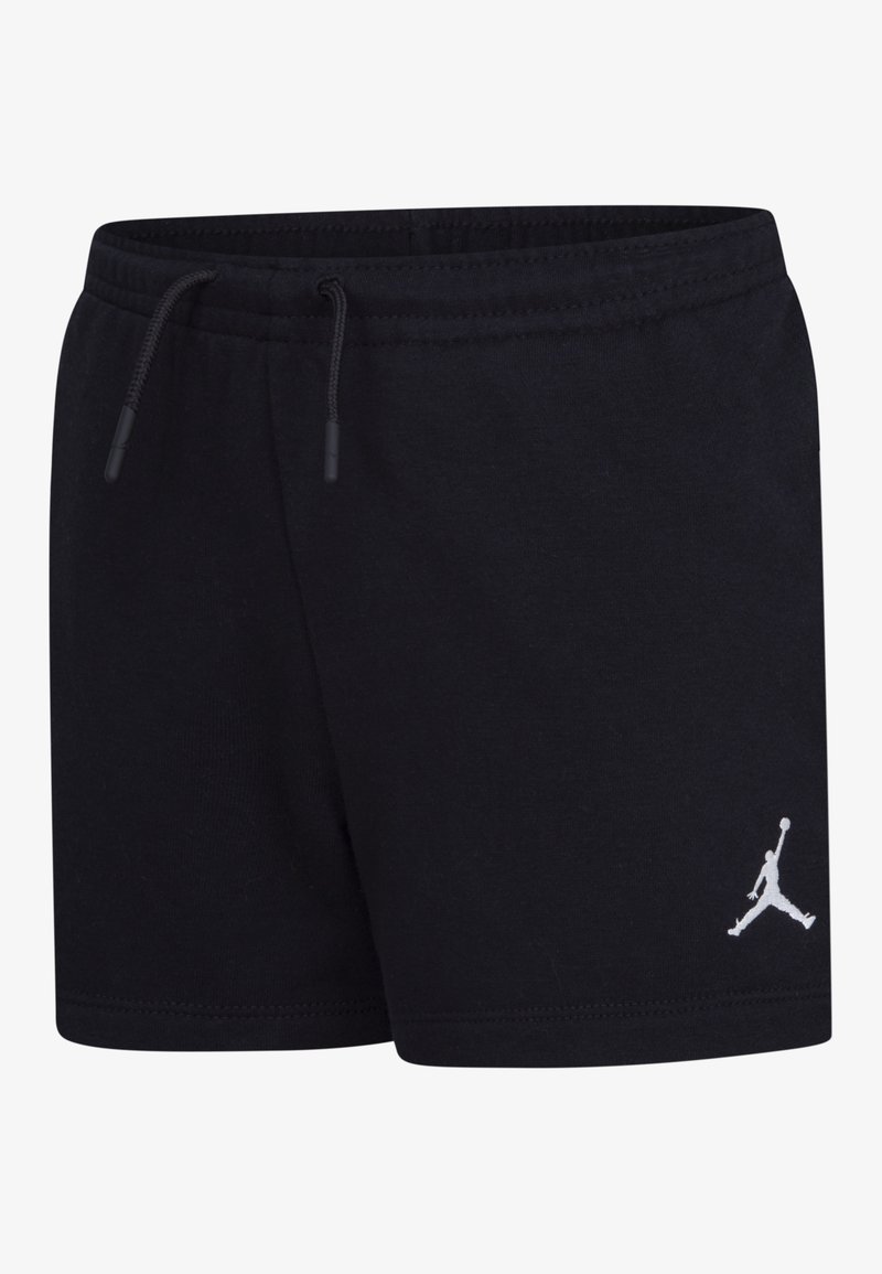 Pantalones cortos de algodón negros con cintura elástica, cordón ajustable y un logo blanco de Air Jordan en la parte inferior derecha.