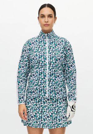 Conjunto de chaqueta con cremallera de manga larga y falda en blanco con estampado de leopardo en azul y verde; material ligero; cuenta con detalles contrastantes en blanco.