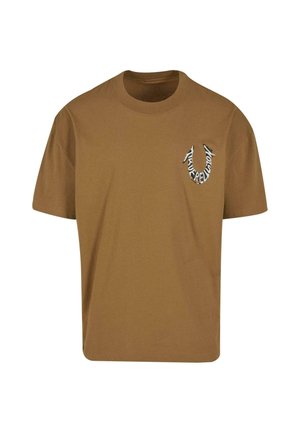 Camiseta de algodón marrón con mangas cortas, un cuello redondo y un diseño gráfico en el pecho con el texto "True Religion."