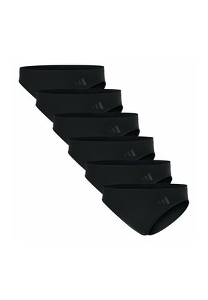 Cinque slip da uomo neri con un logo del marchio sottile disposti in una fila diagonale su uno sfondo bianco.