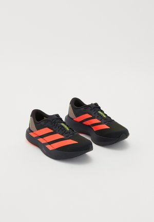 ADIZERO EVO SL - Road running shoes - carbon/lucid red/solar slime