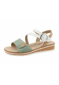 Green and white sandal with a cork platform, featuring a wide toe strap and adjustable ankle strap. Soft suede material and contrasting accents.