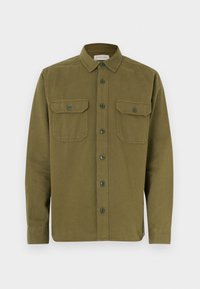 Olíva zöld színű pamut ing gombos elejű, két zsebbel elöl és hosszú ujjakkal. Vékony gallérral és kerekített alsó résszel rendelkezik.