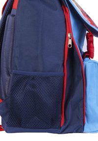 Navy blue backpack with red accents, featuring a mesh side pocket, a large zippered compartment, and smooth fabric texture.