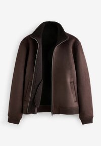 Veste marron zippée avec doublure douce en polaire, poignets côtelés et deux poches latérales, montrée partiellement ouverte sur fond blanc.