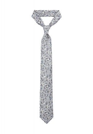 Wąski, wzorzysty krawat z kwiatowym wzorem w odcieniach niebieskiego i białego. Wykonany z gładkiej tkaniny, wyposażony w zakończenie w kształcie ostrego punktu oraz węzeł.
