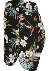 Svarta shorts med ett livfullt blommönster i rosa, blått och grönt. Elastisk midja, loose fit och lättviktigt tyg.