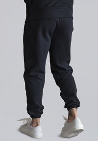 SIKSILK JOGGERS - Tracksuit bottoms - black