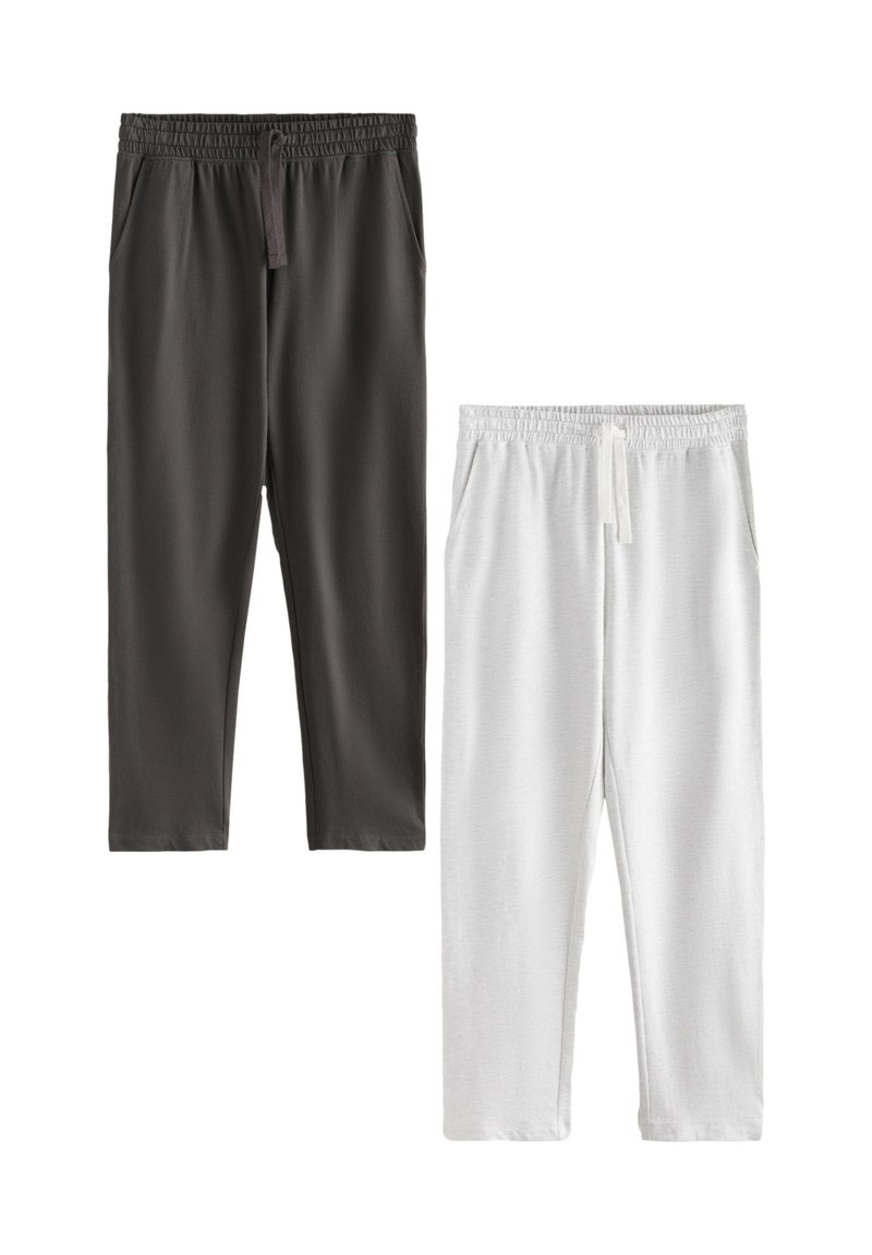 To par joggingbukser: et mørkegråt og et hvidt. Begge har elastisk taljebånd med snoretræk og sidelommer. Glat tekstur.