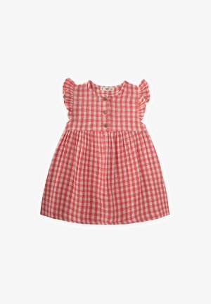 Sarkana un balta pārbaudīta kleita ar īsām viļņotām piedurknēm, apaļu dekoltē un sešiem koka pogām priekšpusē. Platas svārku formas dizains.