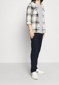 ARKET Kalhoty - blue