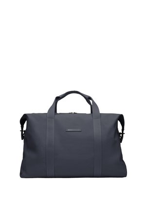 Sac de voyage gris foncé en matériau durable, équipé de deux poignées supérieures, d'une fermeture éclair et de forme rectangulaire. Design minimaliste.