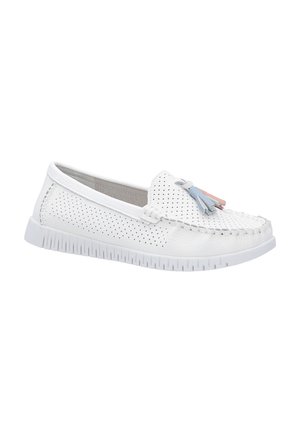White leather slip-on shoes featuring perforated design, braided detailing, and light blue and pink tassels on the front. Textured rubber sole.