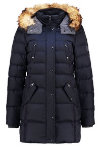 Zwarte gewatteerde jas met een capuchon met bontvoering, doorgestikt ontwerp, zijzakken met rits en zilverkleurige hardwareaccenten. Voorzien van geribbelde manchetten.