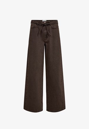 Wide-leg brown denim trousers with a drawstring waistband, front pockets, and a smooth texture. Designed for comfort and casual wear.