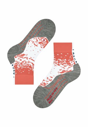 Chaussettes multicolores avec un motif corail et blanc, agrémentées de détails gris. Le design comprend des rayures grises et des éléments de marque en marine.