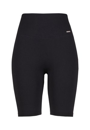 Pantalones cortos de ciclismo negros de cintura alta con textura acanalada y una pequeña etiqueta metálica de la marca en el lado izquierdo cerca de la cintura.