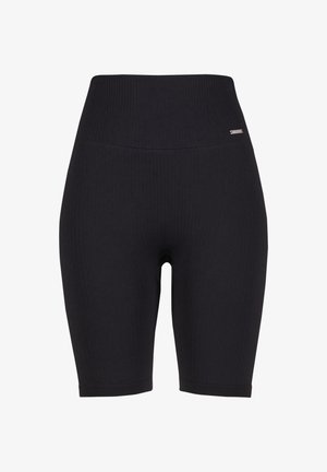Short de cyclisme côtelé noir taille haute avec une petite étiquette métallique de la marque sur le côté gauche près de la taille.