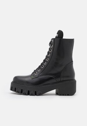 Botines con plataforma - black