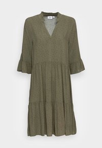 Olivově zelené šaty ke kolenům s černými puntíky, volánkovým výstřihem do V, třičtvrtinovými rukávy a sukní s vrstvami.