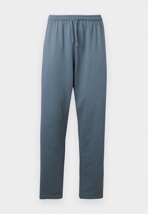 Blågrå joggebukse med elastisk midje, justerbar snøring og rette ben, vist mot en hvit bakgrunn.