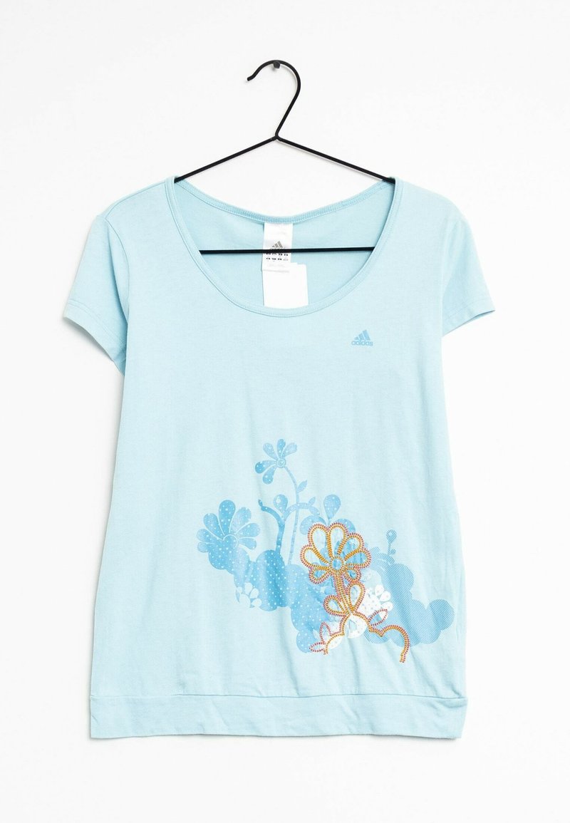 Light blue T-shirt made of soft fabric, featuring a floral design in blue and orange embroidery at the bottom. Short sleeves, round neckline.