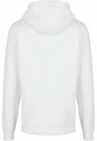 Hvit hettegenser med kengurulomme, hette og ribbestrikkede mansjetter. Laget av et mykt, glatt stoff, designet for komfort og bevegelsesfrihet.