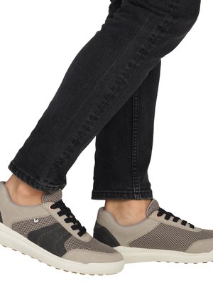 Gray sneakers featuring a mix of suede and mesh material, with black laces, a textured sole, and subtle color accents on the side.