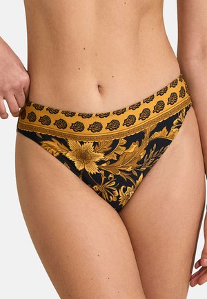 Bas de bikini floral noir et or avec une large ceinture à motif et des détails floraux complexes. Texture lisse, design ajusté.