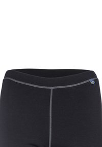 Svarta leggings med en jämn textur, elastisk midja, med grå sömmar och en liten blå och gul flaggakcent.