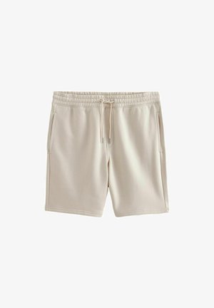 Pantaloni scurți din bumbac bej, cu talie elastică și șnur, având buzunare laterale și o textură netedă. Design simplu, cu croială dreaptă.