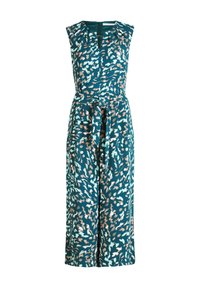 Ujjatlan, türkizkék overall, amely világos rózsaszín és fehér, texturált, forgó mintázattal rendelkezik. Kulcslyuk nyakkivágással és megkötős derékkal rendelkezik.