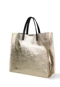 Sac tote doré métallisé avec un design structuré, poignées en cuir noir et détails de couture visibles. Texture lisse et intérieur spacieux.