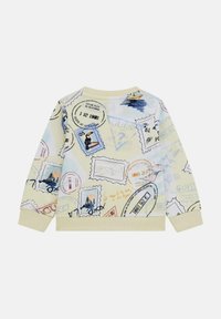 Felpa gialla chiaro con un collage di design timbrati, tra cui barche e testo scritto a mano, con polsini e scollatura a costine.