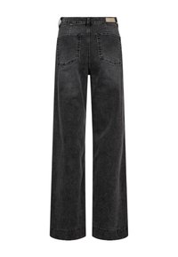 Jean en denim noir taille haute à jambes larges avec deux poches arrière et passants pour ceinture, vu de dos.