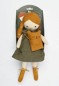 Doll with reddish-brown hair, wearing a green dress, yellow shoes, and carrying a small brown cat in a pouch. Soft fabric materials.