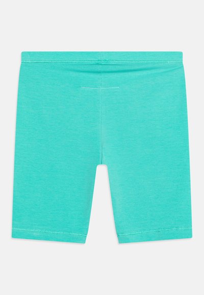 Τυρκουάζ αθλητικές βερμούδες με εφαρμοστό σχέδιο. Φτιαγμένες από μαλακό ύφασμα, διαθέτουν ελαστική μέση και επίπεδες ραφές για άνεση.