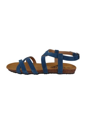 Blue suede strappy sandal with a cork footbed, flat sole, and adjustable ankle strap. Slim, overlapping straps create an open design.