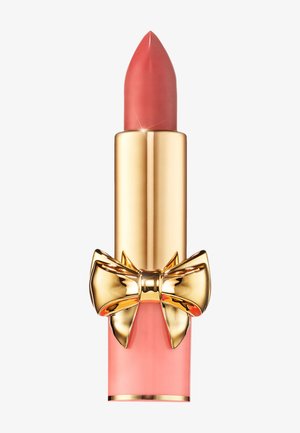 Lipstick with a pointed pink bullet, housed in a gold tube accented by a large golden bow and a translucent pink base.